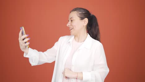 woman making a video call on the phone.