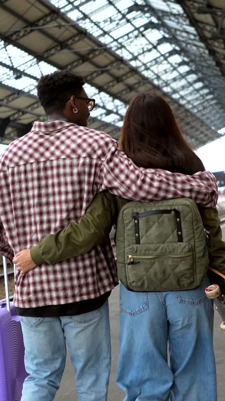 Couple Traveling at Train Station