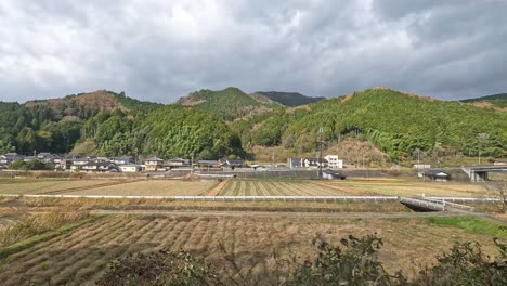 train passing through a rural landscape.