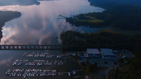 Drone-Shot-River-Bridge-Boats-Marina-Trees-Sky-Clouds-morning