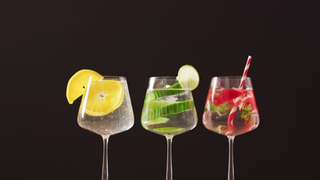 close up of drinks with fruit on wooden board, with copy space