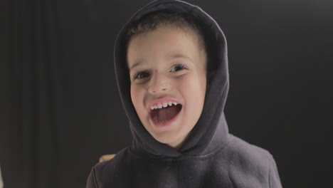 Young-Baby-Boy-smiling-and-showing-different-facial-reactions-to-the-camera-while-doing-a-film-casting-and-camera-test-shot-on-4K