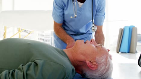 male paramedic during cardiopulmonary resuscitation