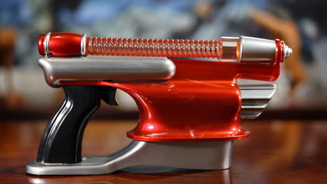 retro red and silver sci-fi toy ray gun