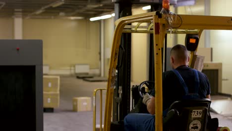 forklift operator in a warehouse