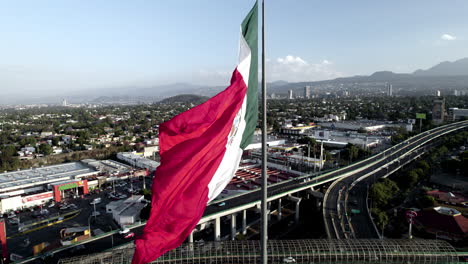 static drone shot of mexico national flag