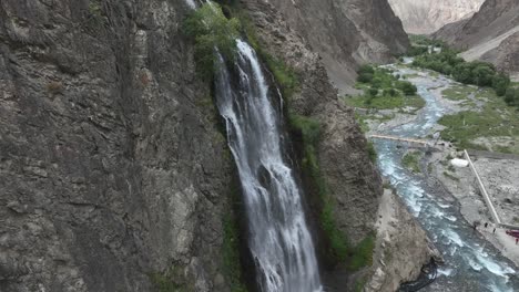 Drone-footage-of-circulating-a-natural-spring-in-a-mountain-area-of-Pakistan,-Mantoka,-Skardu