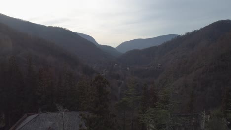 mountain valley with abandoned building