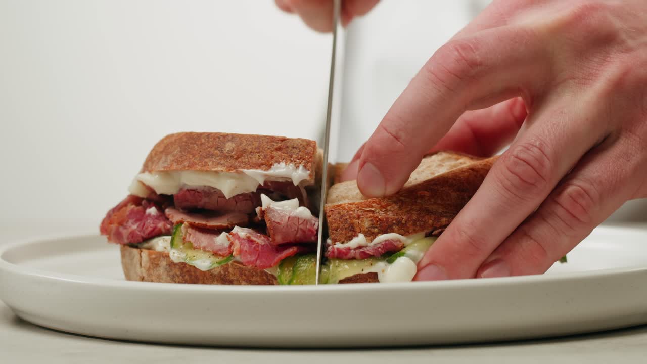 Cutting a delicious sandwich