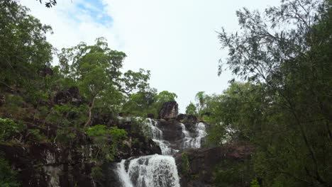 Rainy-season-Cedar-Creek-Falls-Whitsundays-Airlie-Beach-Proserpine-Waterfall-slow-motion-river-Australia-reserve-Palm-Grove-QLD-Queensland-spring-summer-autumn-winter-sunny-blue-sky-clouds-pan