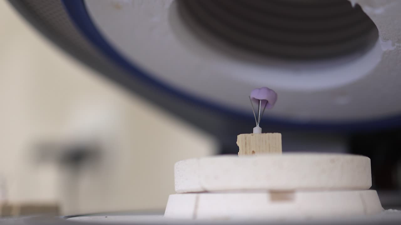 Digitally produced zirconia tooth crown in dental machinery in office