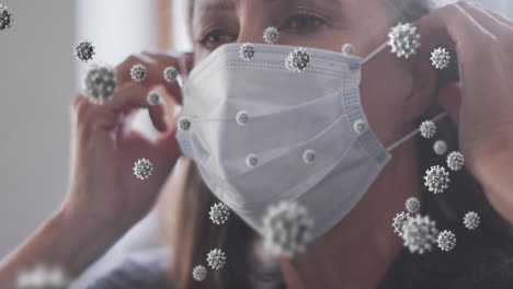 animación de células de virus sobre una mujer caucásica mayor con máscara facial