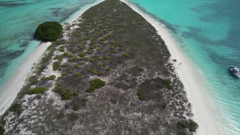 serene los roques archipelago in venezuela with clear turquoise waters and coral reefs, aerial view