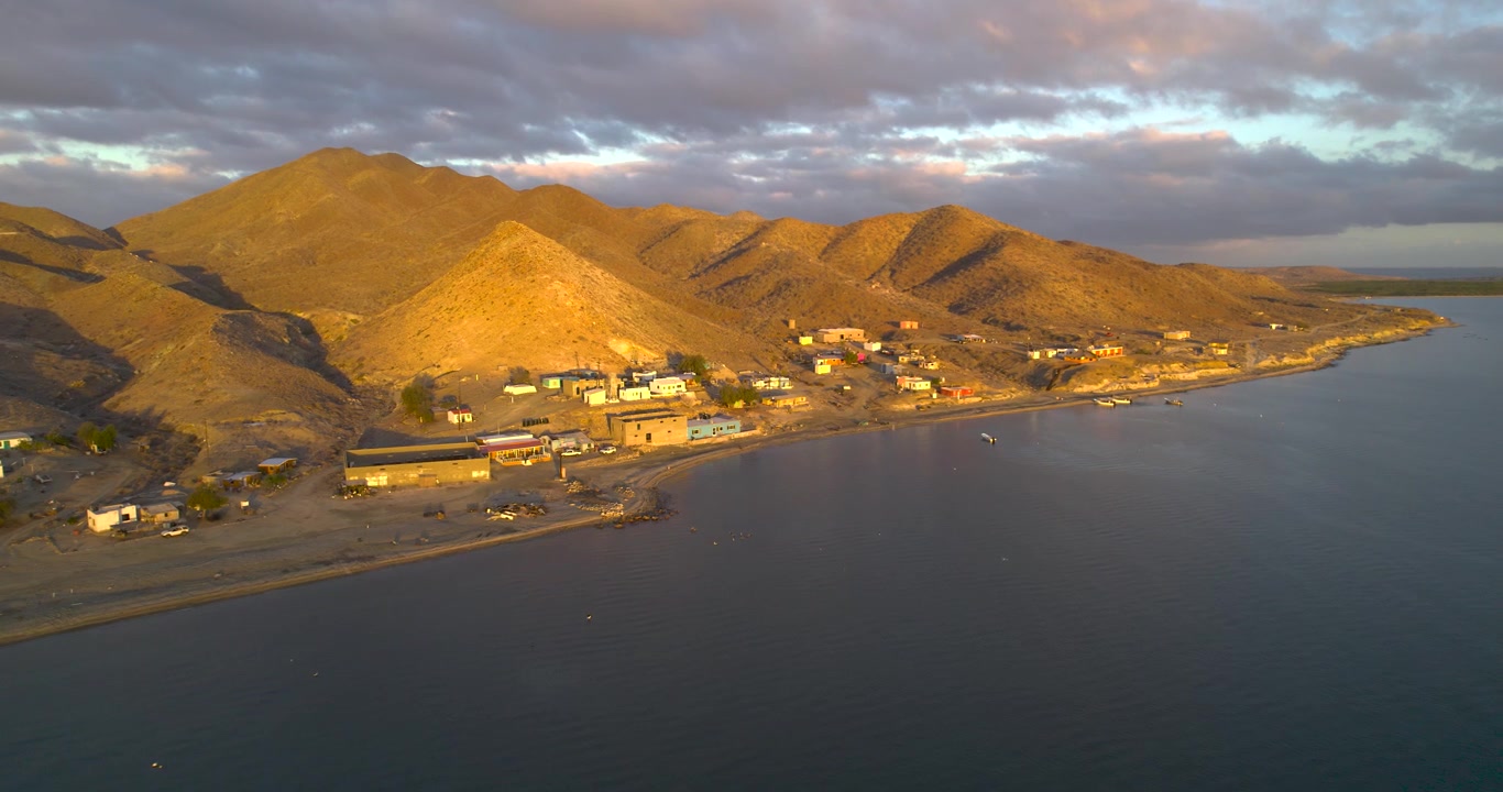 ​Dramatic Ocean ​Sunset drone shot of beautiful Magdalena Bay Mexico with mountains 3