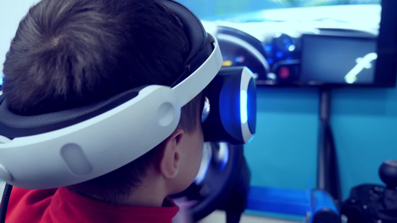 Child using VR headset for virtual driving experience