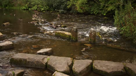 wide-shot-of-disused-water-mill-workings-on-the-river-dove