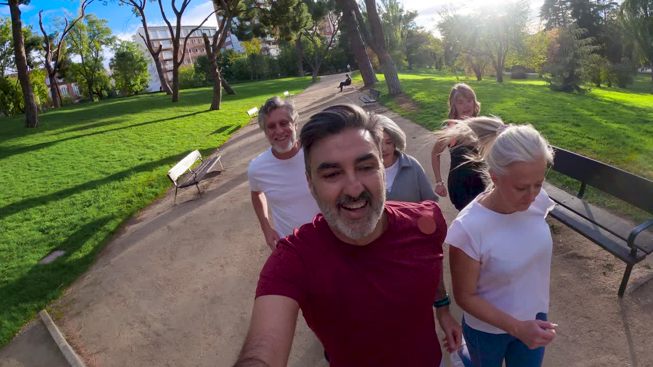Group of Senior Adults Enjoying a Run in the Park