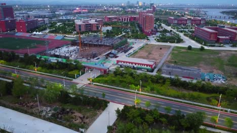 Drone-view-of-Beijing-Jiaotong-University-at-sunset-time,-China