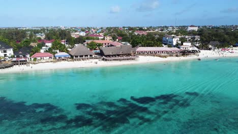 A-drone-shot-of-the-coral-reef-of-Nungwi-beach-on-the-tropical-island-of-Zanzibar-in-Tanzania-in-Africa