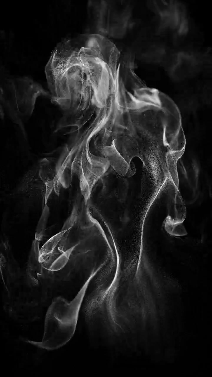 Particelle di fumo bianco astratto in ascesa su sfondo nero