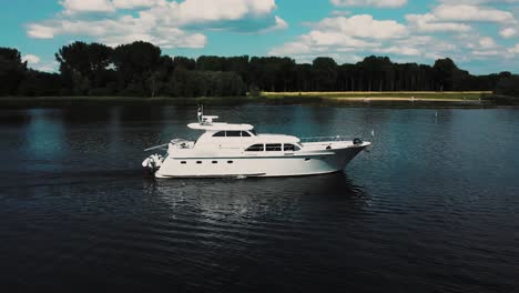 luxurious white yacht sailing on water