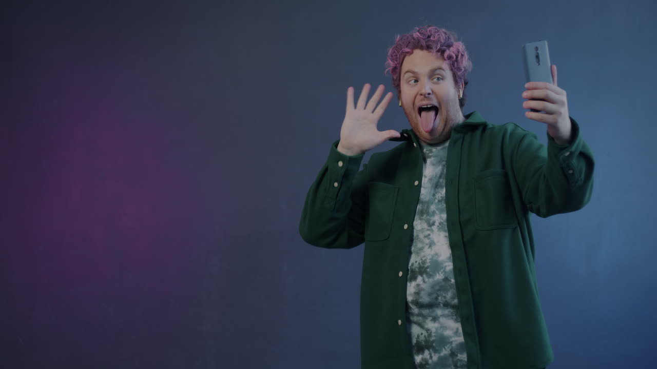 Man taking a selfie with a smartphone