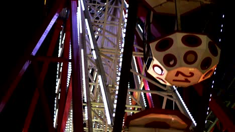 ferris wheel in amusement park at night