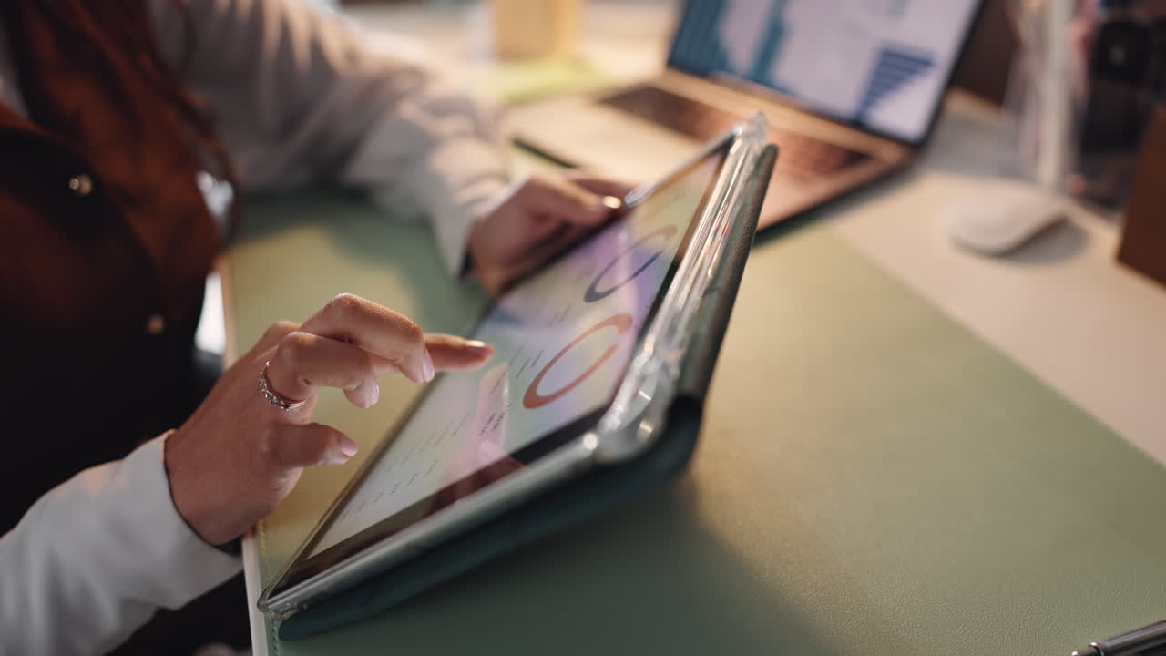 Woman using a tablet for business analysis