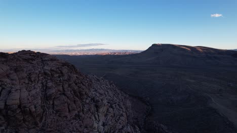 drone-rotate-around-red-rock-canyon-geologic-formation-in-Las-Vegas-California-during-golden-hours