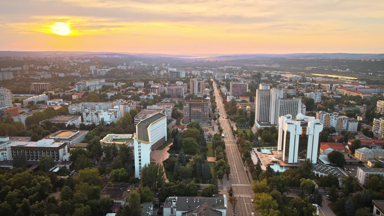 Aerial sunset drone view of Chisinau city center with presidency and parliament building. Moldova