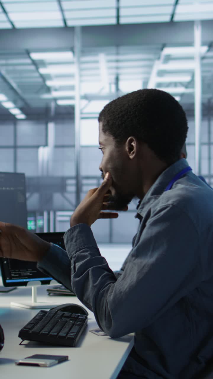 Vertical video Server room engineers using artificial intelligence