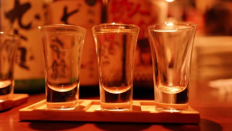 sequential filling of a sake glass set