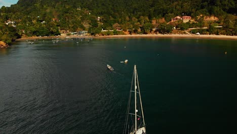 Aerial-footage-of-a-fishing-vessel-returning-to-port-after-fishing