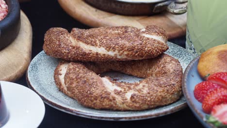 turkish simit and strawberries for breakfast