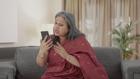 Angry-Indian-old-woman-shouting-on-video-call