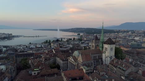 geneva switzerland church reformer aerial drone establishing shot fountian lake swiss alps