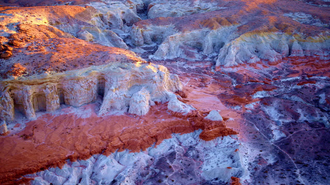 A drone glides slowly and dramatically over the vivid hills and striking hoodoos near the Utah-Arizona border.