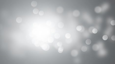 fondo animado bokeh borroso blanco. video 4k loop-able adecuado para el título revela animación de navidad, fiesta, eventos y nombres comerciales.