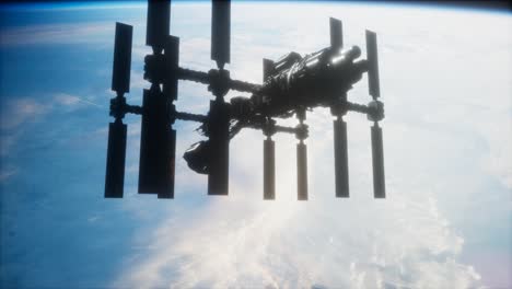 una vista de la tierra y una nave espacial. iss está orbitando la tierra