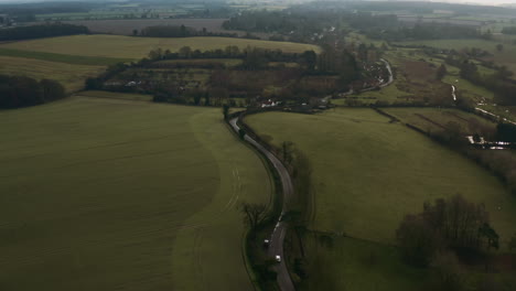 aerial drone shot flying over a country lane to showcase the epic landscape