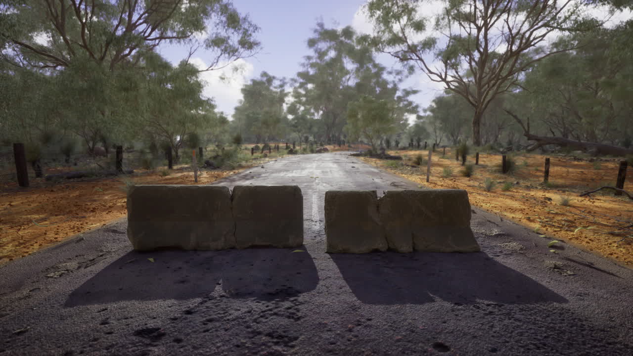 Blocked pathway through a quiet desert landscape under a bright sky