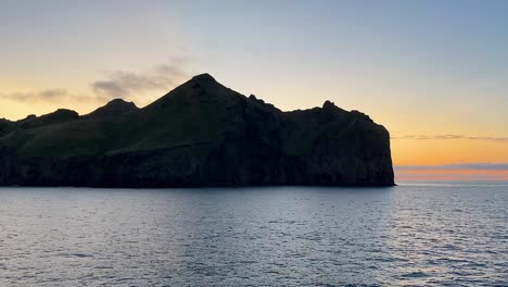 silhouette of westman islands of iceland during sunset