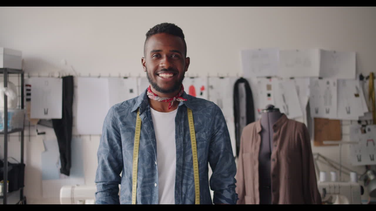 Smiling Fashion Designer in Studio