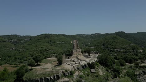 The-Catalan-flag-and-the-ruins-of-Castell-de-Calders,-Barcelona-Spain