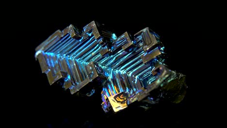 seamlessly rotating a colorful mineral (bismuth) in front of black background