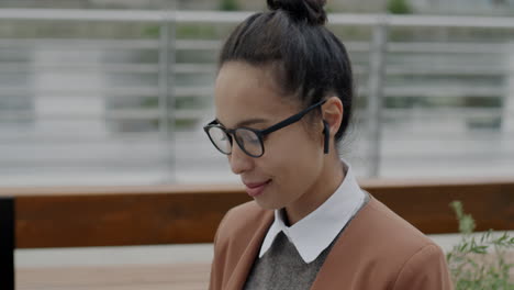 woman outdoors listening to music