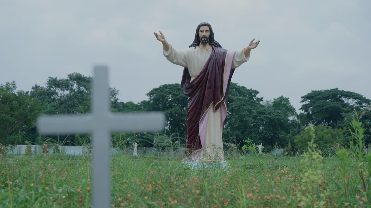 The statue of Jesus Christ with his arms outstretched is inside the Bandel Church