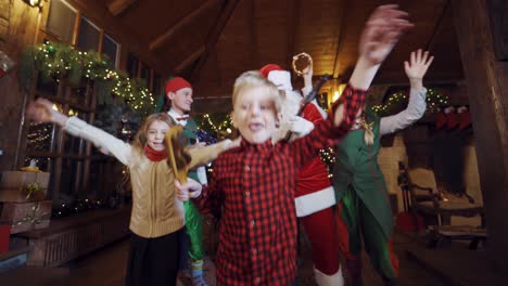 kids having fun with santa claus. children having fun with santa claus and elves