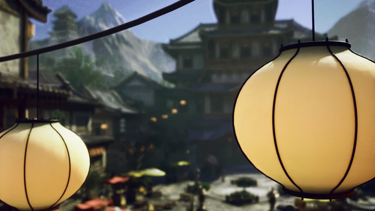 Lanterns illuminate an ancient village surrounded by mountains