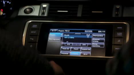 car dashboard with infotainment system and volume control